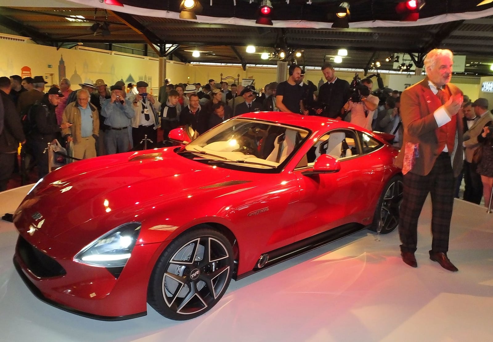 The red 2017 TVR Griffith revival car unveiled on stage at the Goodwood Revival