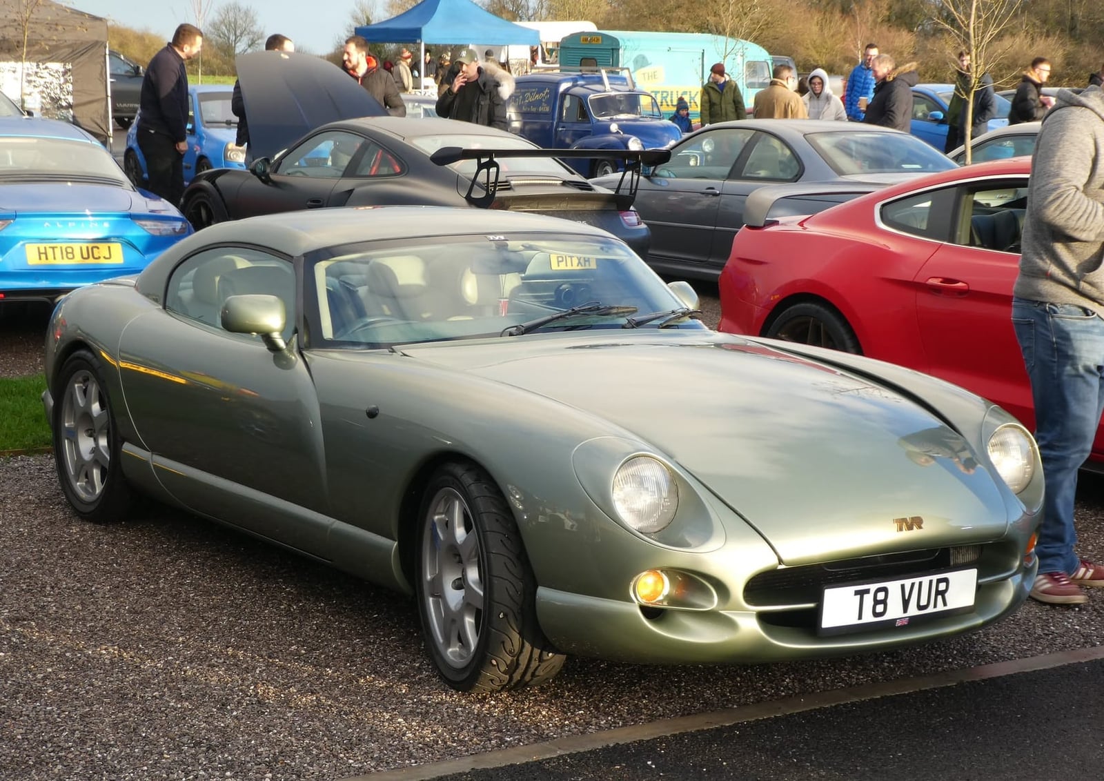 A green 1999 TVR Cerbera with UK registration T8 VUR, front three-quarter view at a show