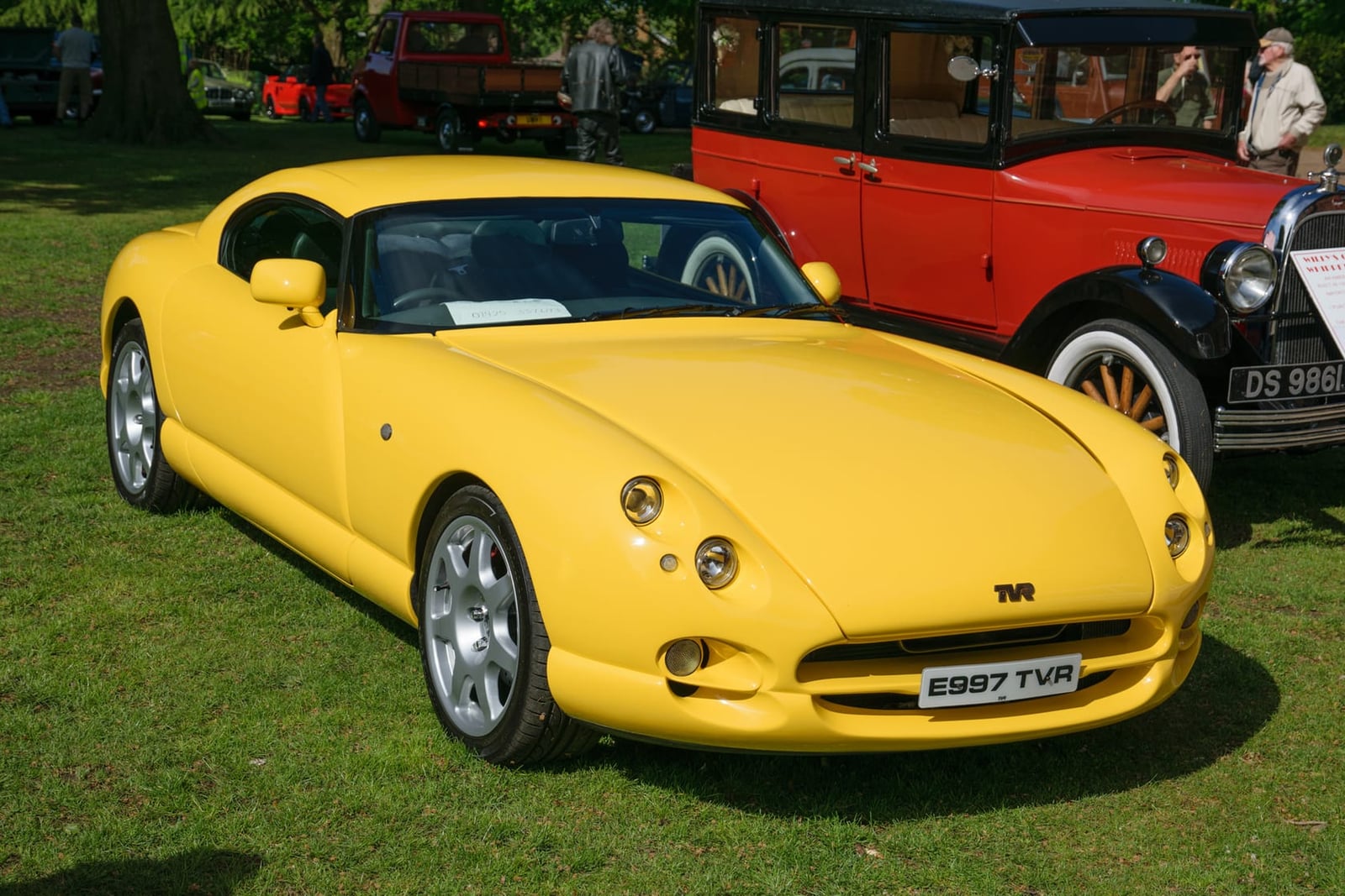 A yellow 1996 TVR Cerbera 4.2 V8 with UK registration E997 TVR at a show