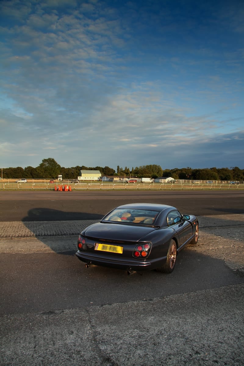 A TVR Cerbera on an airfield at sunset