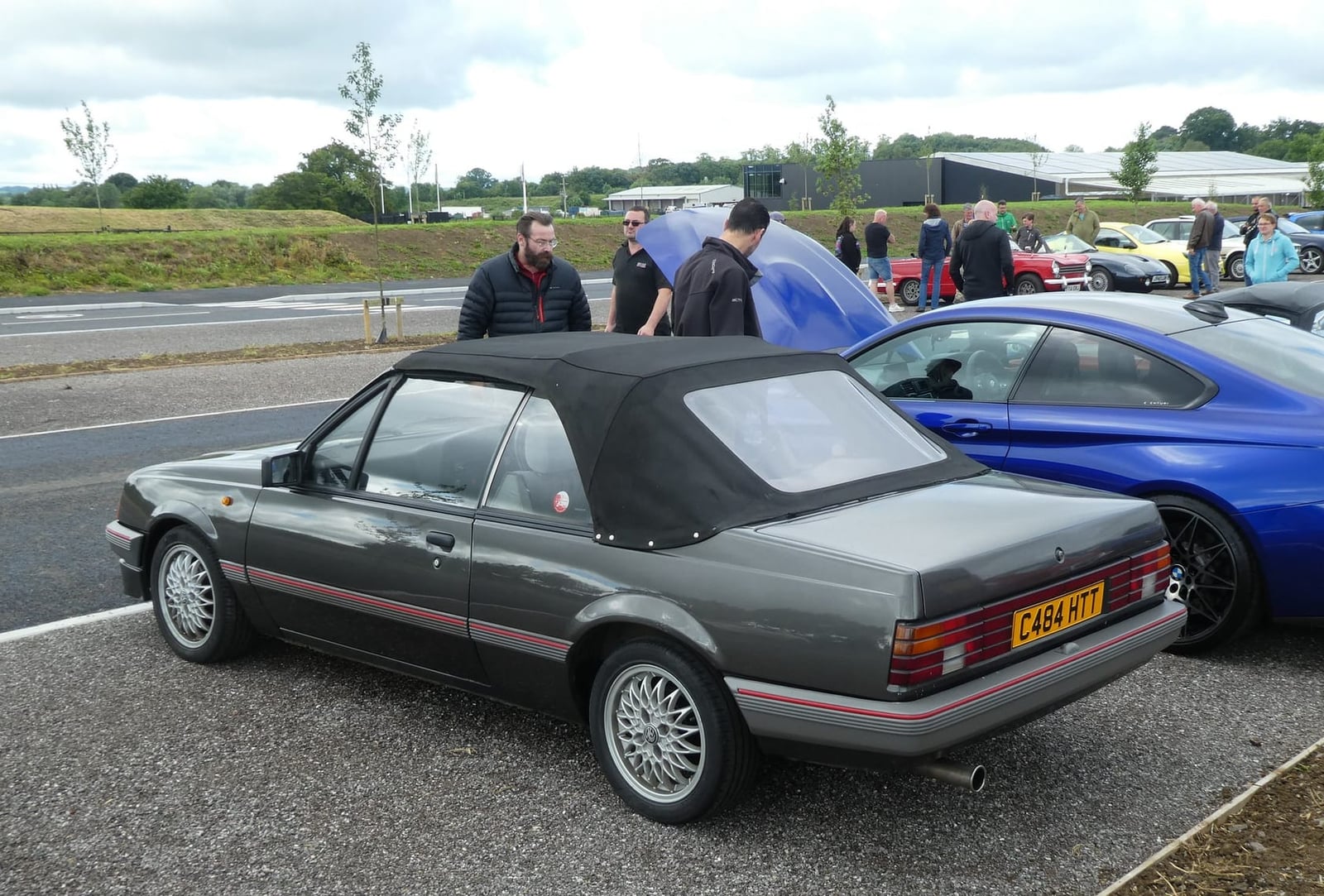 A grey 1986 Vauxhall Cavalier 1.8 convertible with the roof up