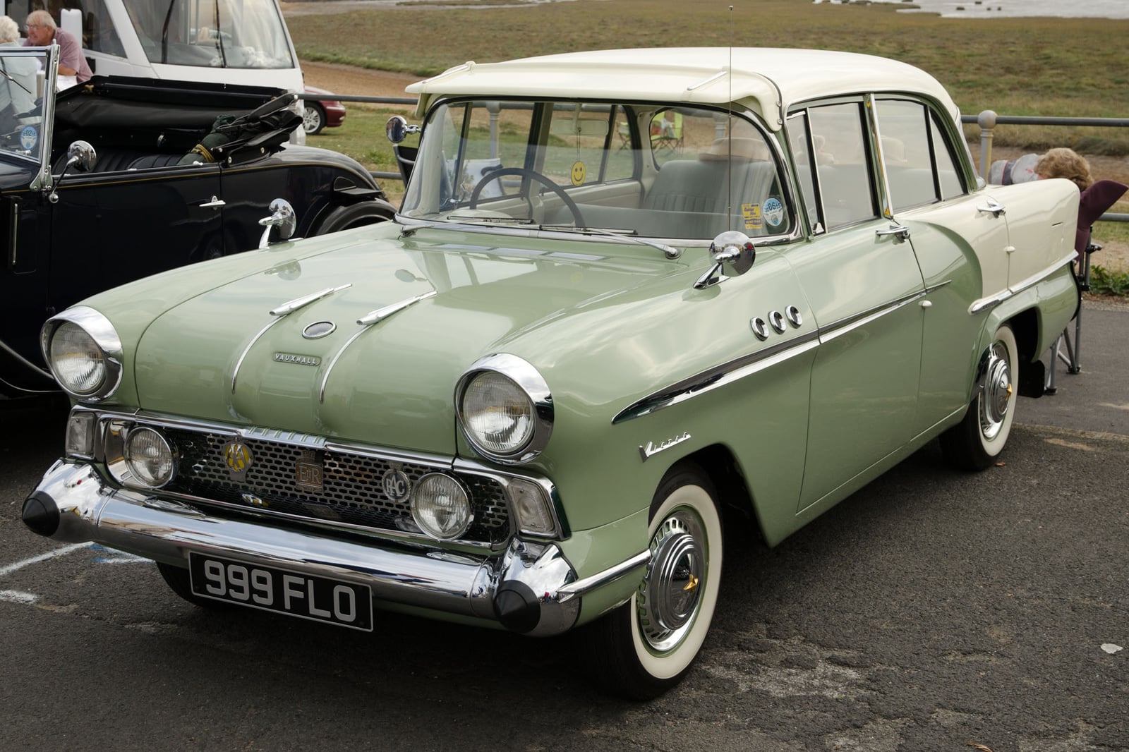 A two-tone green-over-cream Vauxhall Victor F (1959) at an outdoor classic car show