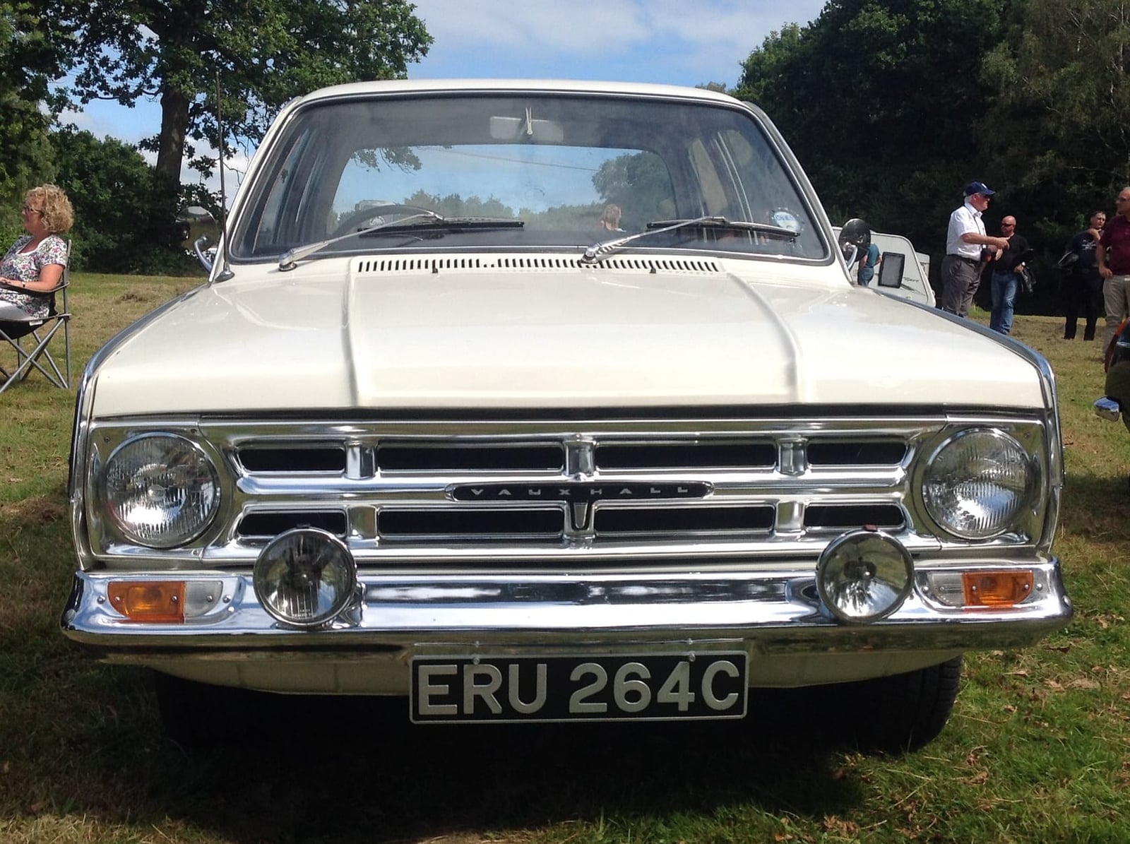 A white Vauxhall VX4/90 FC on grass at a classic car show, front three-quarter view, UK registration ERU 264C