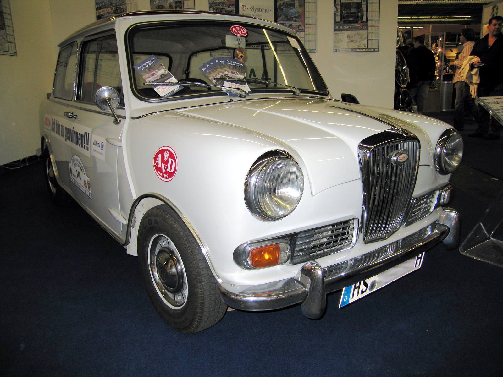 A silver Wolseley Hornet Mk II on display, front three-quarter view
